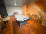 Gameroom in the basement offers a air hockey, foosball table & the laundry room 